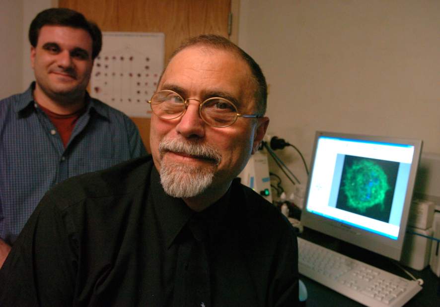 man with black shirt smiling